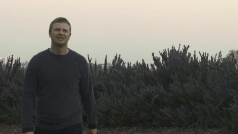 A man walks up a mountain. Stock Footage 99609816