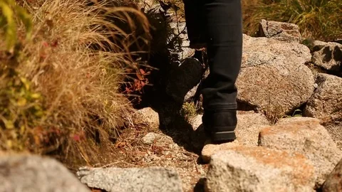 Man walks mountain trail away. Stock Footage 80947221