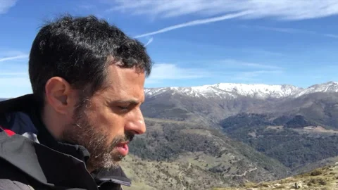 A Man walks in the mountains Stock Footage 133117848
