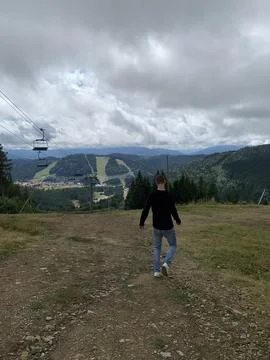 A man walks in the mountains Stock Photos