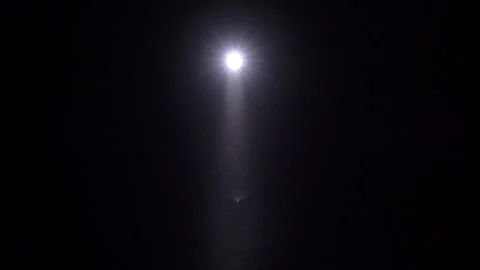 A man walks at night with a flashlight Stock Footage 244600694