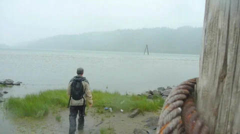 Man Walks Out into River Stock Footage 874985