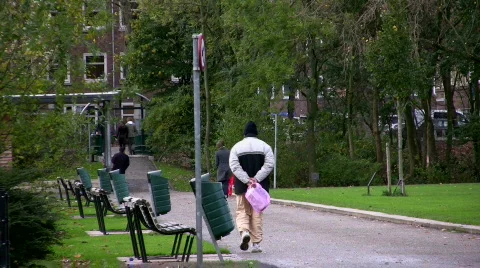 Man walks in park Stock Footage 108245