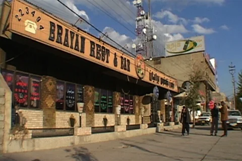Man walks past front of Brayan Restaurant and Bar. Stock Footage 86753603