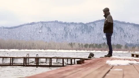 The man walks on the pier Stock Footage 74163171
