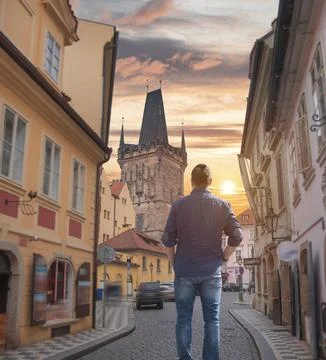 Man walks in Prague. Stock Photos