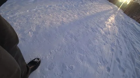 A man walks in the snow Video stock 168102815