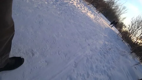 A man walks in the snow Video stock 168102959