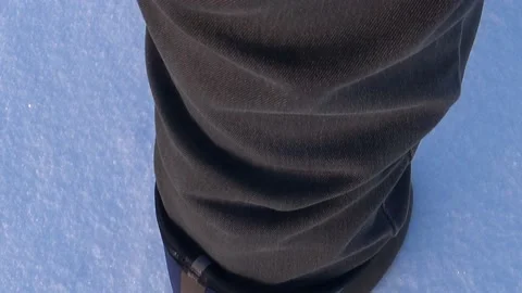 A man walks in the snow Video stock 168156607
