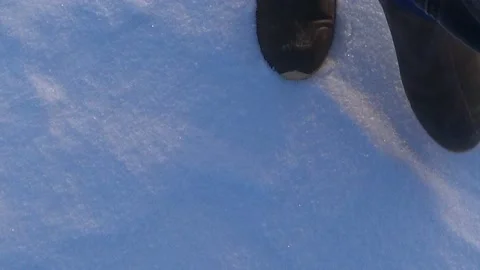 A man walks in the snow Video stock 168156648