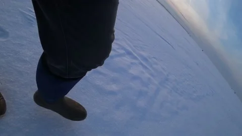 A man walks in the snow Video stock 168156804