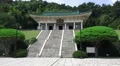 Man Walks Up Stairs At Chungnyeolsa Sacred Shrine Busan South Korea 4K 4k or 4k+ Resolution