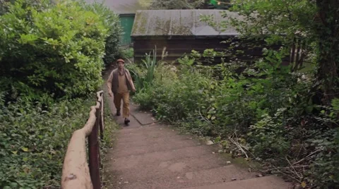 Man walks up stairs Stock Footage 41958140