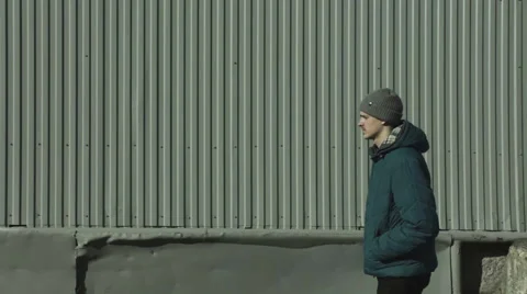 Man walks through the city Stock Footage 60066199