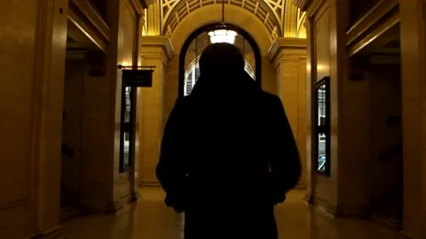 Man walks through corridor follow behind RAW Stock Footage 237260091