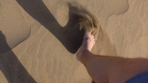 Man walks through the desert. Stock Footage 77145394