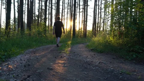 A man walks through the forest after quarantine Video stock 138585580