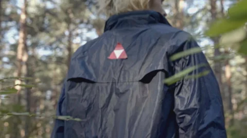 Man walks through forest and finds something. Stock. Young man comes out of Stock Footage 276909692