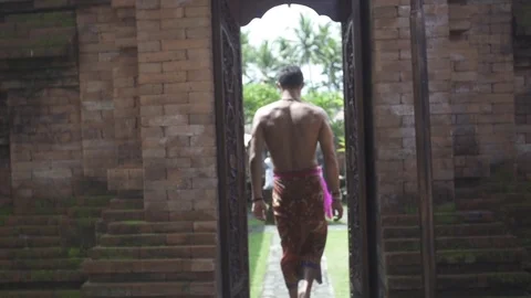 Man Walks Through Hindu Temple Door Slow Motion Stock Footage 106784363