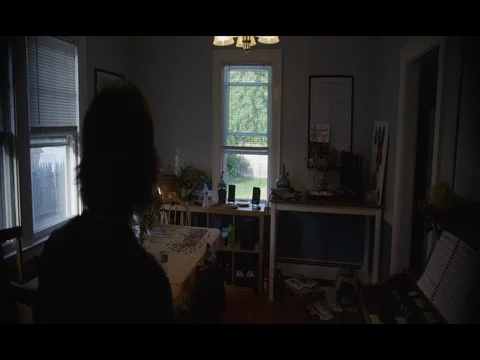 A man walks through his house. Stock Footage 72987360