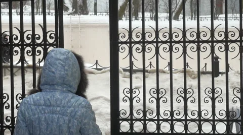 Man Walks Through An Iron Gate Video stock 59664372