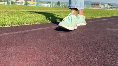 A man walks through the stadium. close-up of the legs in the stadium Stock Footage 287124057