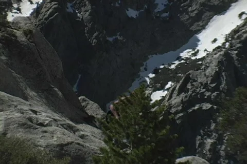 A man walks through wilderness. Stock Footage