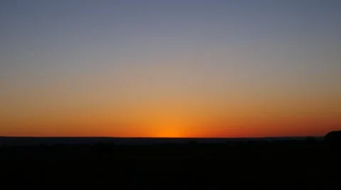Man walks towards the setting sun. Stock Footage 54515379