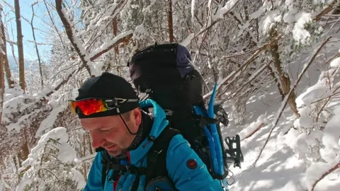 Man Walks The Trail On A Winter Hike. He Takes Selfies Stock Footage 219949860
