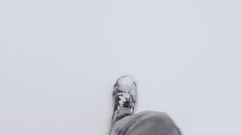 A man walks in very deep snow, first-person view Stock Footage 122149814