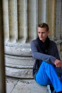 Man at a wall Photos