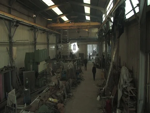 Man in warehouse dolly move Stock Footage 71248074