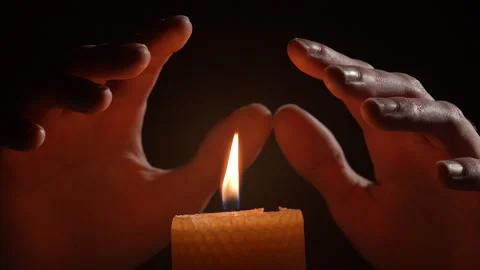 Man warm hands on candle no heating and electricity. energy crisis concept. Stock Footage 329304014