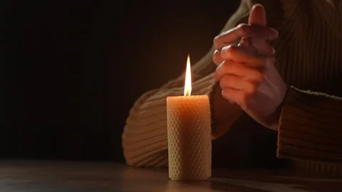 Man warm hands on candle no heating and electricity. energy crisis Stock Footage 329305113
