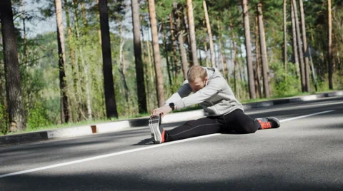 Man warm up before running Stock Footage 63029178