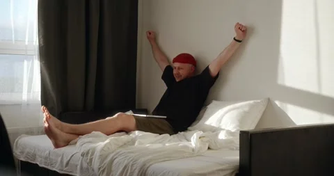 A man is warming up after a day of work during quarantine. Stock Footage 302900786