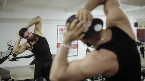 A man warming up in the gym Stock Footage 56637211