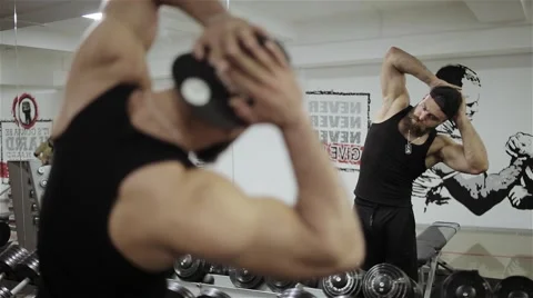 A man warming up in the gym Stock Footage 56637214