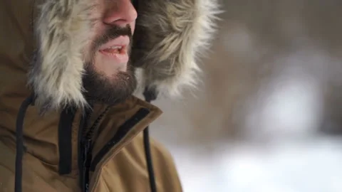 Man is warming his cold hands Stock Footage
