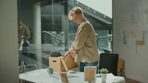 The Man Was Fired, and He Packs Things in a Drawer. Work in the Office Stock Footage 239114345