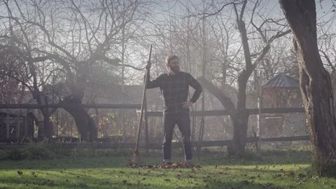 Man was robbing the grass and got tired Stock Footage 164285019