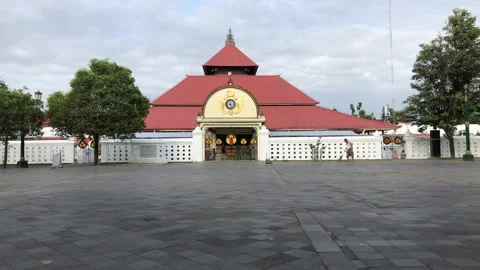 A man was sweeping the courtyard of the mosque Stock Footage 223863702