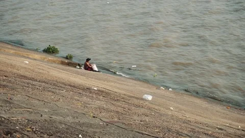 Man washes in Cambodia river 스톡 동영상 132053719