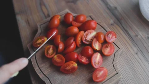 A man washes, cleans and cuts vegetables Stock Footage 131493473