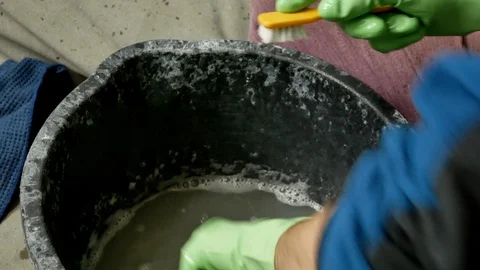 Man washes handholds Stock Footage 103663867