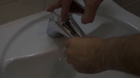 A man washes hands Stock Footage 97652233