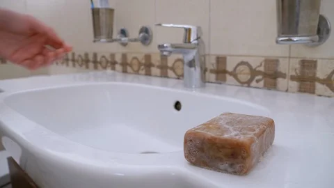 Man Washes Hands in Sink using Washing Soap in Bathroom. Protection Coronavirus Stock Footage 126582061