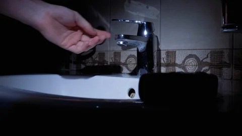 Man Washes Hands in Sink using Washing Soap in Bathroom. Protection Coronavirus Stock Footage 126585096