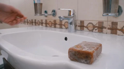 Man Washes Hands in Sink using Washing Soap in Bathroom. Protection Coronavirus Stock Footage 126614141