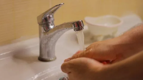 Man washes her hands with soap Stock Footage 286027528